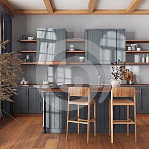Farmhouse vintage wooden kitchen in gray and beige tones with island and stools. Parquet floor, shelves and cabinets. Colonial