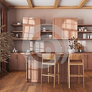 Farmhouse vintage wooden kitchen in orange and beige tones with island and stools. Parquet floor, shelves and cabinets. Colonial