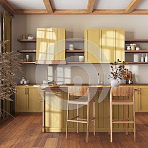 Farmhouse vintage wooden kitchen in yellow and beige tones with island and stools. Parquet floor, shelves and cabinets. Colonial