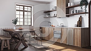 Farmhouse wooden kitchen and dining room in white and dark tones. Cabinets and table with chair. Parquet floor. Wabi sabi interior