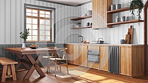 Farmhouse wooden kitchen and dining room in white and gray tones. Cabinets and table with chair. Wallpaper and parquet floor. Wabi