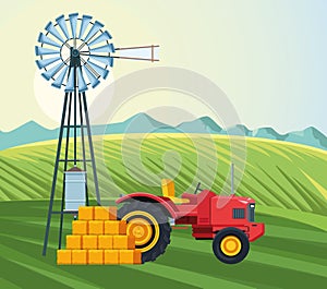 Farming field with tractor windmill and bales of hay farm