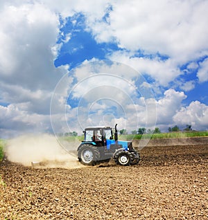 Farming tractor in a field