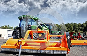 Farming tractor and mower