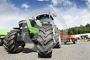 Farming tractor and plough