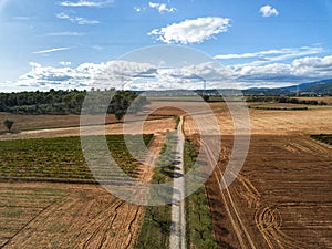 Farmland and agricultural production background in an aerial view from a drone. Agriculture and food production