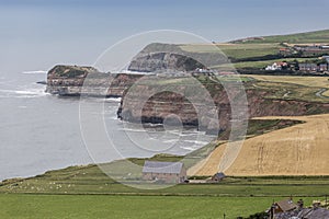 Farmland and cliffs south of Staithes in Yorkshire