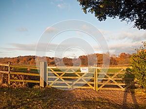 farmland countryside path trail track farm fence sign private road wood