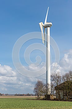 Farmland with damaged wind turbine after a heavy storm in the Netherlands