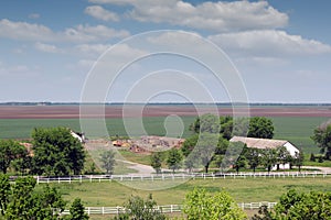 Farmland with horse corral