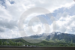 Farmland and Trees in the wasatch mountains near ogden utah