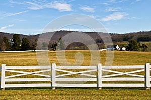 Farmland with White Fence Foreground