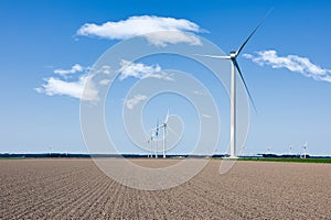 Farmland with wind turbine farm near Dutch village Zeewolde