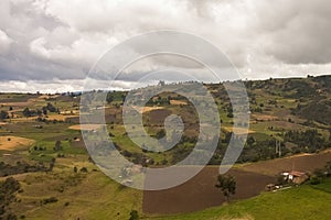 The farmlands and crop fields of the altiplano cundiboyacense photo