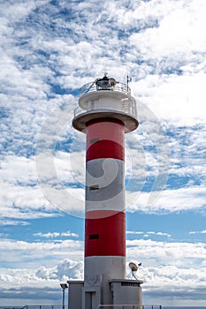 Faro de Fuelcaliente, red-white lighthouse tower on south of La Palma siland, Canary, Spain photo
