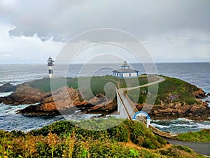 Faro de Isla Pancha se encuentra en la Isla Pancha, en la parte mÃ¡s occidental de la RÃ­a de Ribadeo, Lugo, Galicia photo