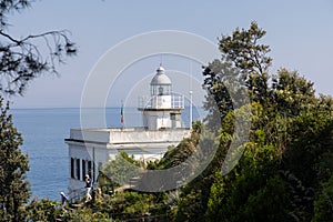 Faro  Lighthouse  of Portofino with outdoor cafe, bar. with a sea view.