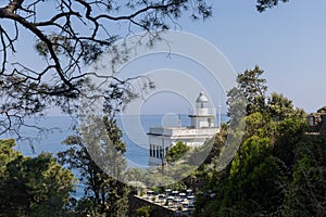 Faro  Lighthouse  of Portofino with outdoor cafe, bar. with a sea view.