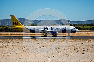 FARO, PORTUGAL - Juny 30, 2017 : Monarch Flights aeroplane departure from Faro International Airport. Monarch is a British airline