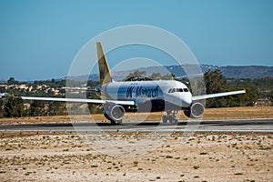 FARO, PORTUGAL - Juny 30, 2017 : Monarch Flights aeroplane departure from Faro International Airport. Monarch is a British airline