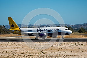 FARO, PORTUGAL - Juny 30, 2017 : Monarch Flights aeroplane departure from Faro International Airport. Monarch is a British airline