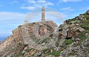 Faro Vilan, Cape Vilan or Cape Villano Lighthouse at famous Costa da Morte Region. CamariÃÂ±as, Galicia, Spain. photo