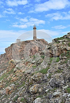 Faro Vilan, Cape Vilan or Cape Villano Lighthouse at famous Costa da Morte Region. CamariÃÂ±as, Galicia, Spain. photo