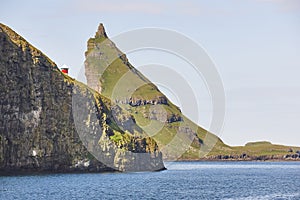 Faroe islands coastline cliffs landscape in Vagar island photo