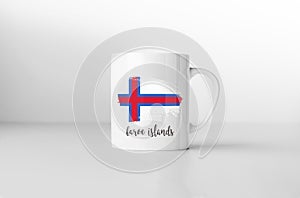 Faroe Islands flag on white coffee mug.