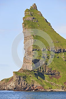Faroe islands green coastline cliffs landscape near Vagar island