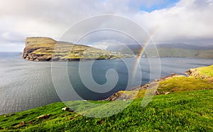 Faroe Islands landscape with rainbow, view of Risin and Kellingin, the giant and the witch view from Tjornuvik