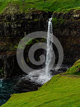 Faroe Islands. MÃÂºlafossur Waterfall. photo