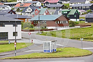 Faroe islands traditional village with empty bus stop, Eysturoy photo