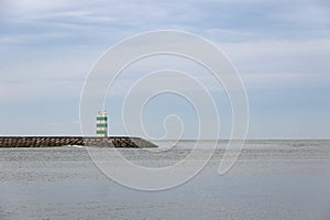 Farol do Pontao lighthouse at the Douro River on a stormy day, Porto, Portugal