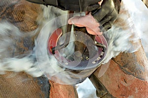 Farrier hot shoeing