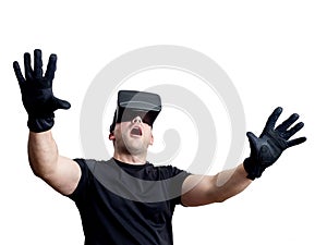 Fascinated man using virtual reality glasses isolated over white