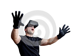 Fascinated man using virtual reality glasses isolated over white