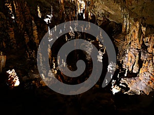 Fascinating stalactites and stalagmites in Postojna Cave, Slovenia photo