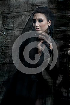 Fashiom model dressed in gothic style. Vamp.