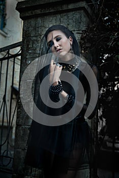 Fashiom model dressed in gothic style. Vamp.