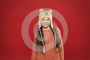 Fashion accessory for winter. Happy girl wear knitted hat. kid fashion. Warm knitting. small child ready for winter