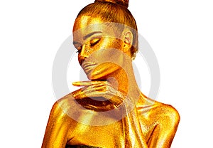 Fashion art Golden skin Woman face Beauty gold metallic body portrait isolated on white background. Christmas Model girl