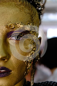 Fashion art Golden skin Woman face portrait
