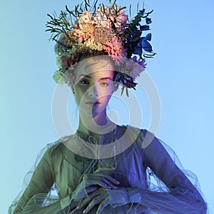 Fashion art photo of beautiful lady in flower diadem