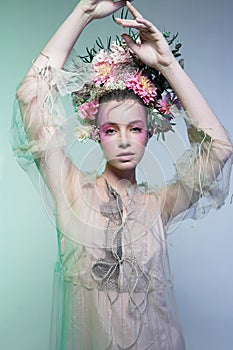 Fashion art photo of beautiful lady in flower diadem