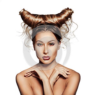 Fashion art portrait of beautiful woman with horns.