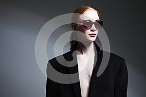 Fashion art studio portrait of elegant girl in geometric black a