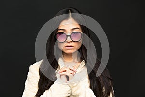 Fashion asian model woman in sunglasses in studio