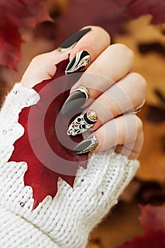 Fashion autumn nail art. Autumn background. Fashion background.