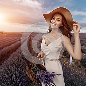 Fashion beautiful model in lavender field in sunset